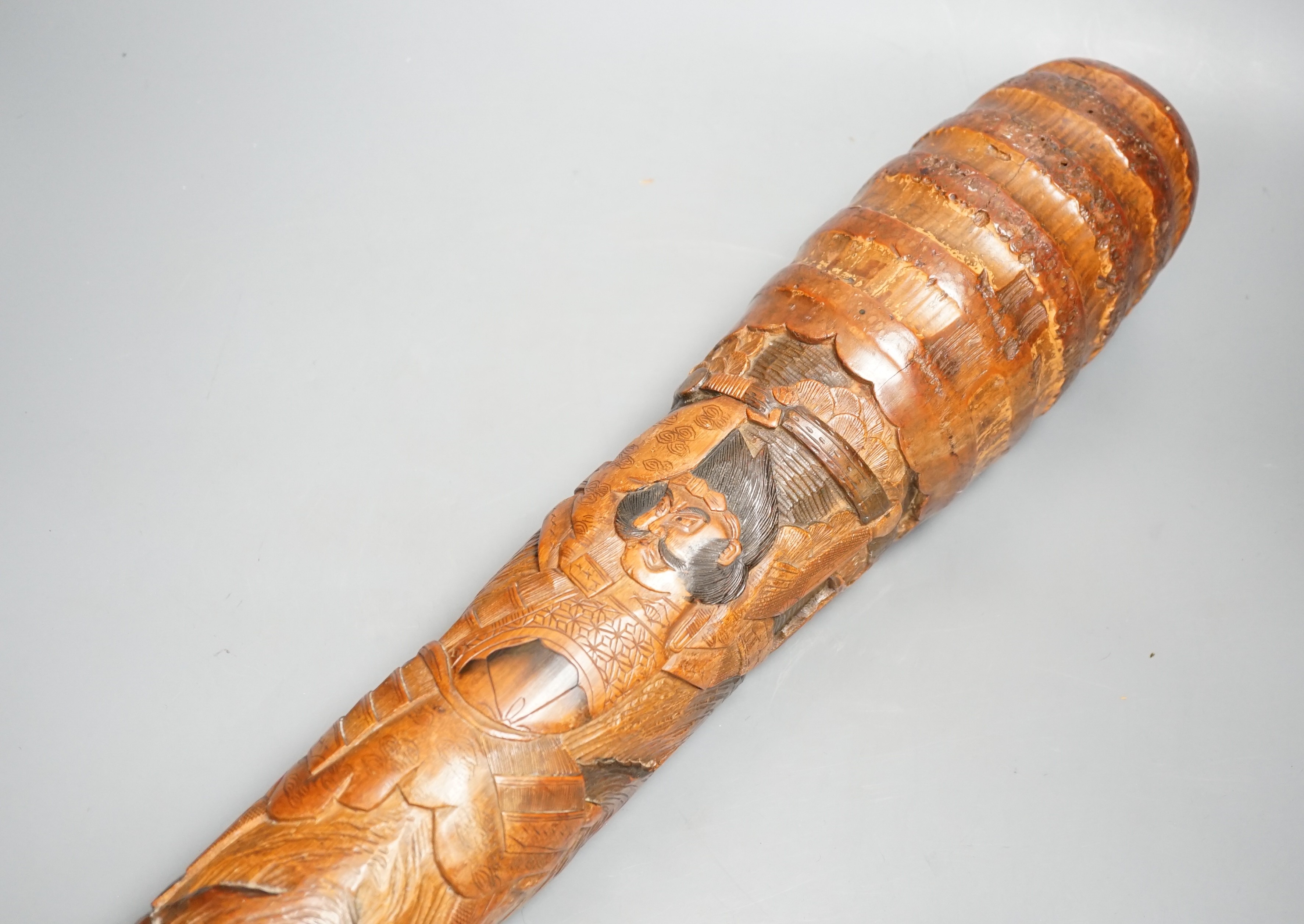 A large Japanese bamboo carving, Meiji period, possibly a drum beater, 105 cms long.